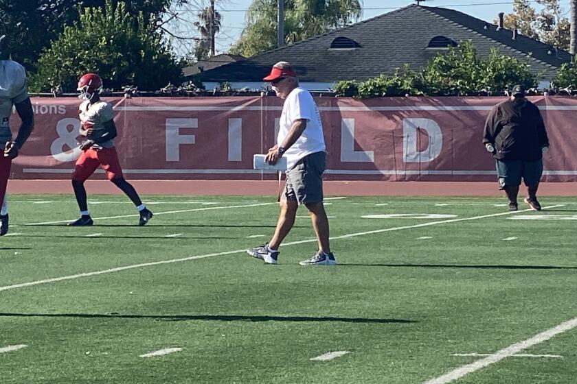Mater Dei coach Bruce Rollinson during practice this week. He's trying to find out about NIL rules for his top athletes.