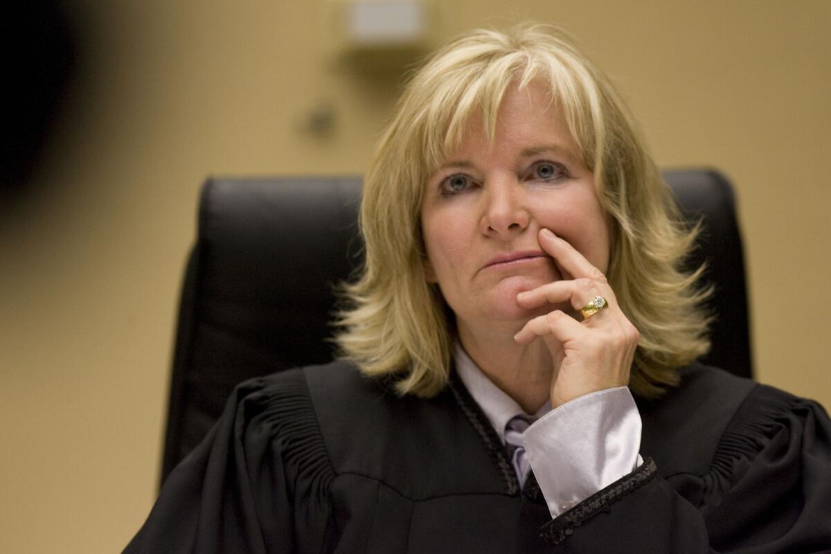 Judge Patricia Cookson performed a wedding for a convicted killer and his longtime girlfriend, just moments after she sentenced the groom to prison. The family of the defendant's victim has protested.