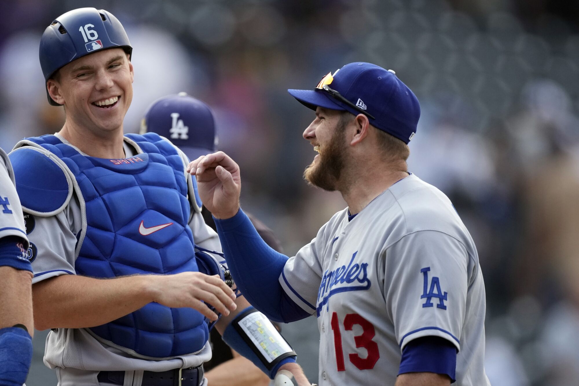 Dodgers first baseman Max Muncy, right, celebrates with catcher Will Smith.