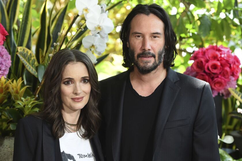 Winona Ryder and Keanu Reeves attend the "Destination Wedding" photo call on Saturday, Aug. 18, 2018, in Los Angeles. (Photo by Jordan Strauss/Invision/AP)