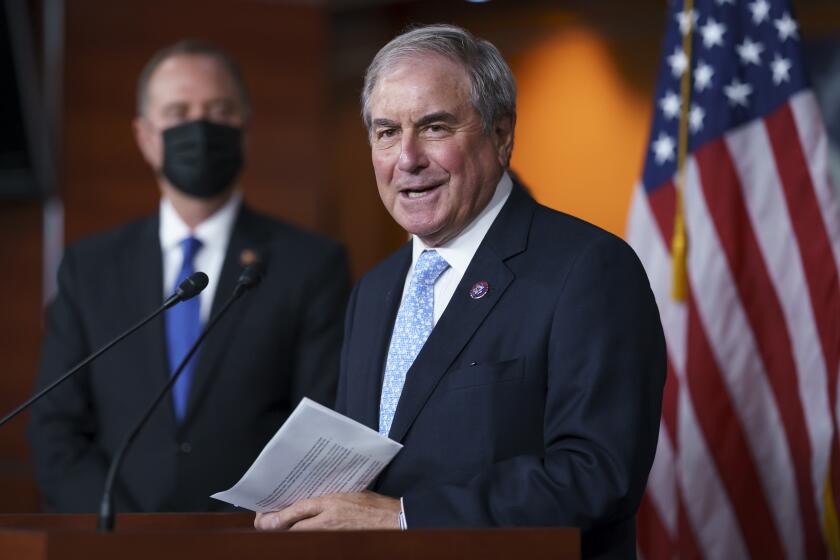 FILE - In this Sept. 21, 2021, file photo House Budget Committee Chair John Yarmuth, D-Ky., joined at left by House Intelligence Committee Chairman Adam Schiff, D-Calif., talks to reporters at the Capitol in Washington. (AP Photo/J. Scott Applewhite, File)