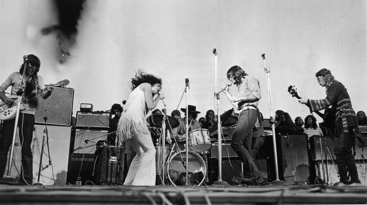 Grace Slick performs with Jefferson Airplane at Woodstock in 1969.
