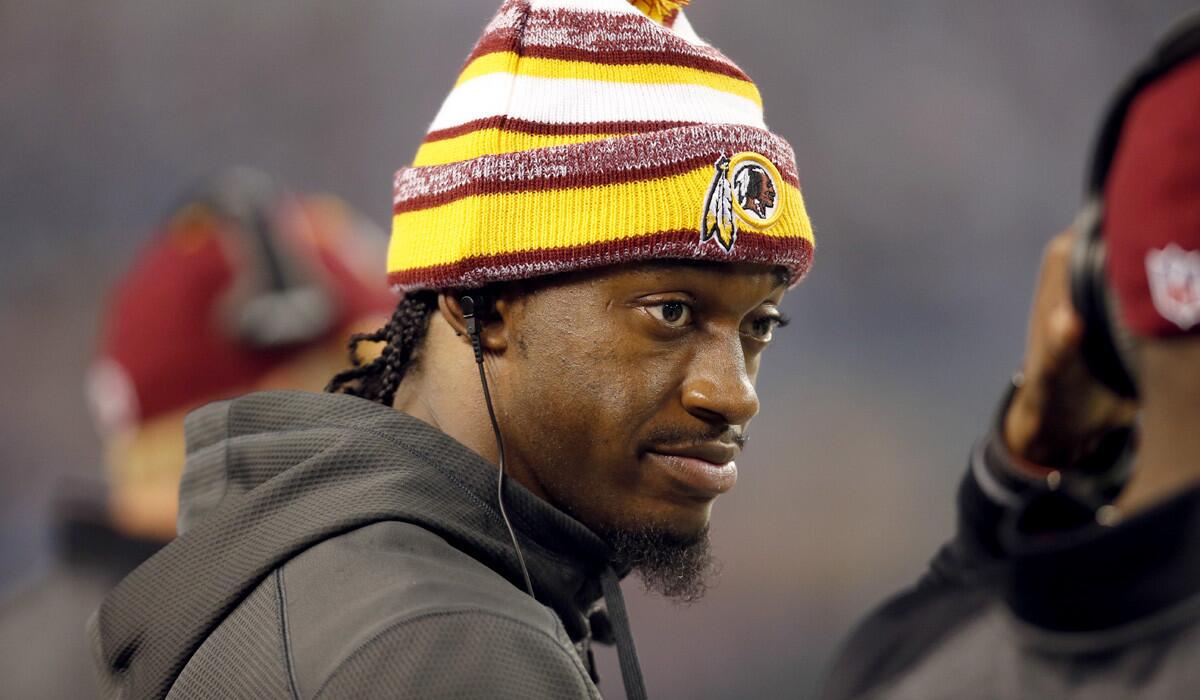 Robert Griffin III is set to leave the sideline and again quarterback the Redskins on Sunday.