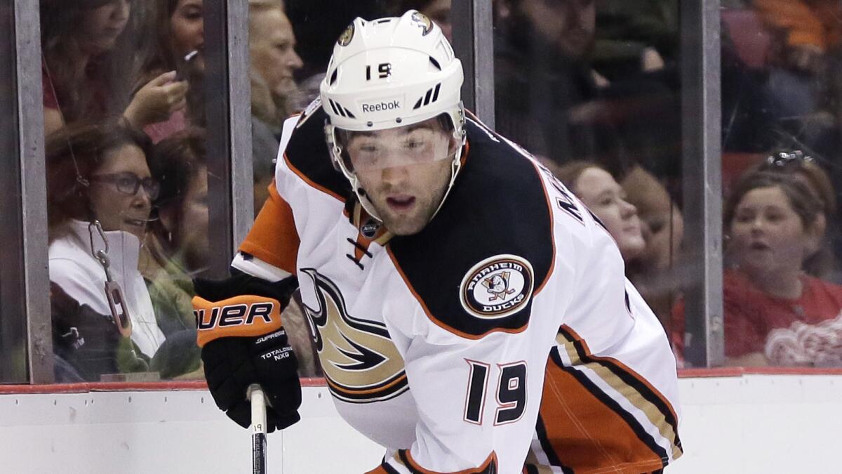 Ducks forward Patrick Maroon plays the puck during a win over the Detroit Red Wings Oct. 11.