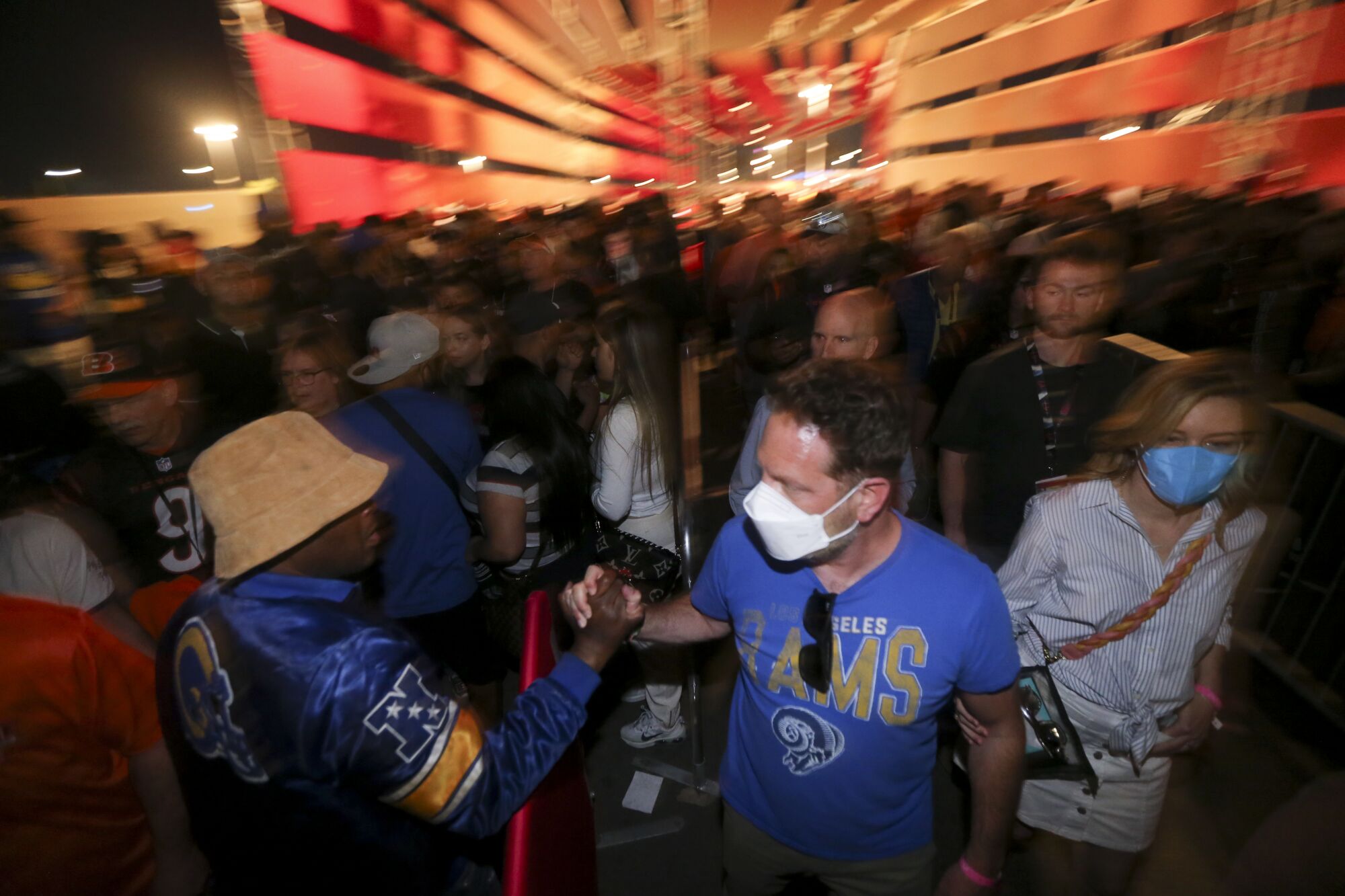 Fans celebrate outside after the Los Angeles Rams won Super Bowl LVI at SoFi Stadium.