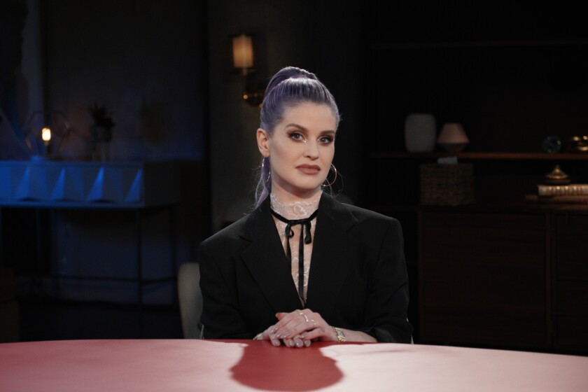 This image released by Red Table Talk shows TV personality Kelly Osbourne, who will appear in an episode of the talk show series to discuss her battle with drug and alcohol addiction. The episode will be available on Wednesday, June 2 on Facebook Watch. (Jordan Fischer/Red Table Talk via AP)