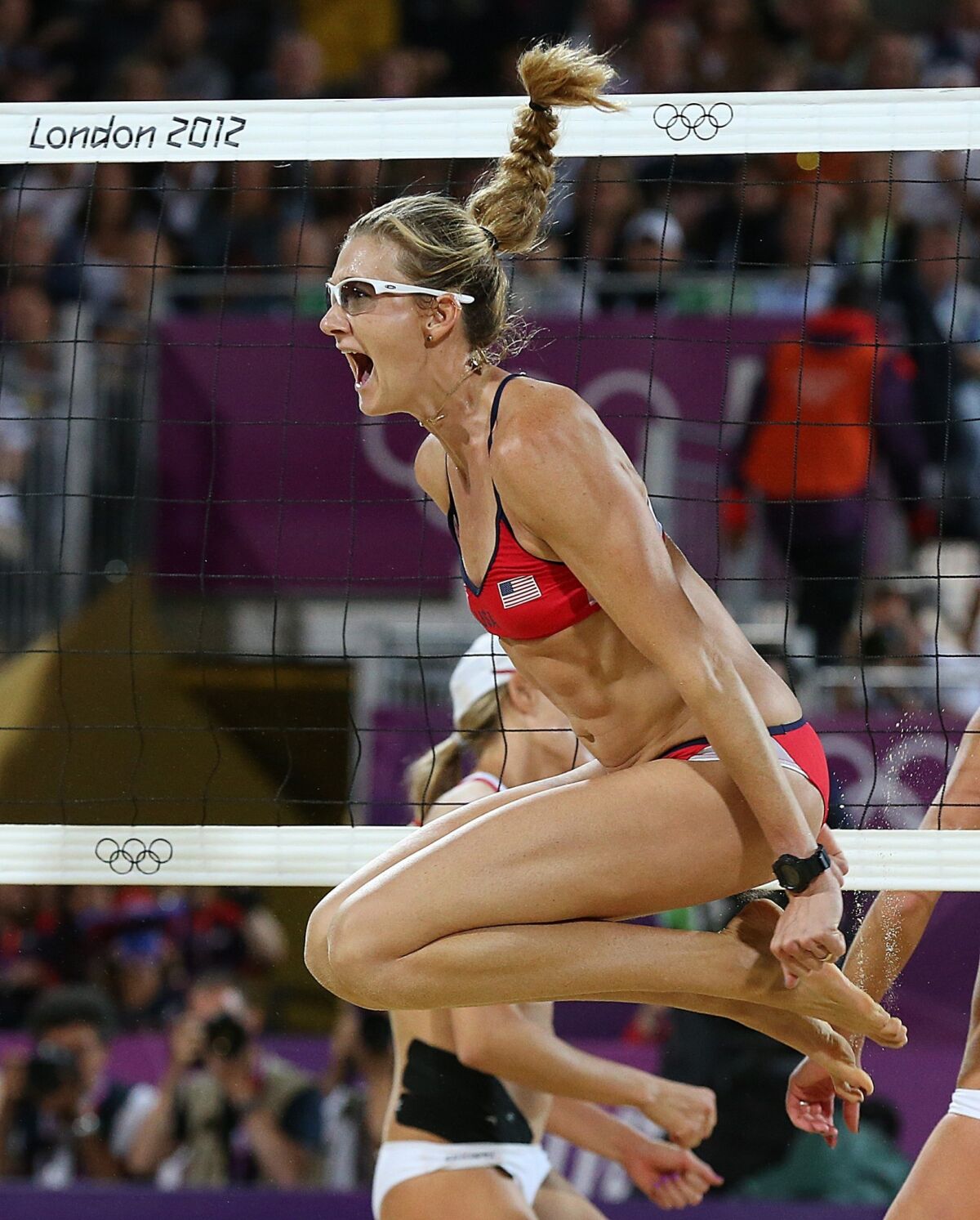 Kerri Walsh Jennings celebrates immediately after winning the women's beach volleyball gold-medal match at the 2012 London Olympics. She's aiming to win a fourth gold medal at the 2016 Rio de Janeiro Olympic Games.