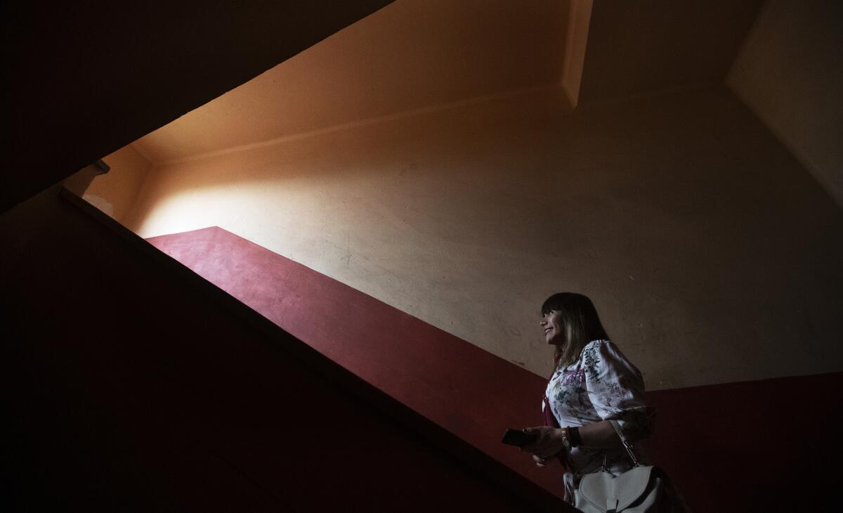 Federal lawmaker Salma Luevano arrives to meet with LGBTQ groups at an apartment building in Mexico City, Thursday, July 1, 2021. From Aguascalientes, Luevano is one of two people to have become the first transgender federal legislators and aims to raise the profile of LGBTQ issues. (AP Photo/Marco Ugarte)