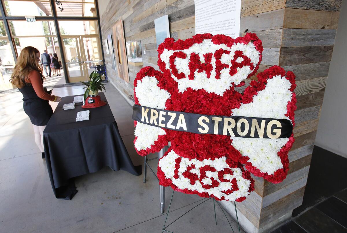 A floral arrangement sits outside the November memorial service for Costa Mesa fire Capt. Mike Kreza.