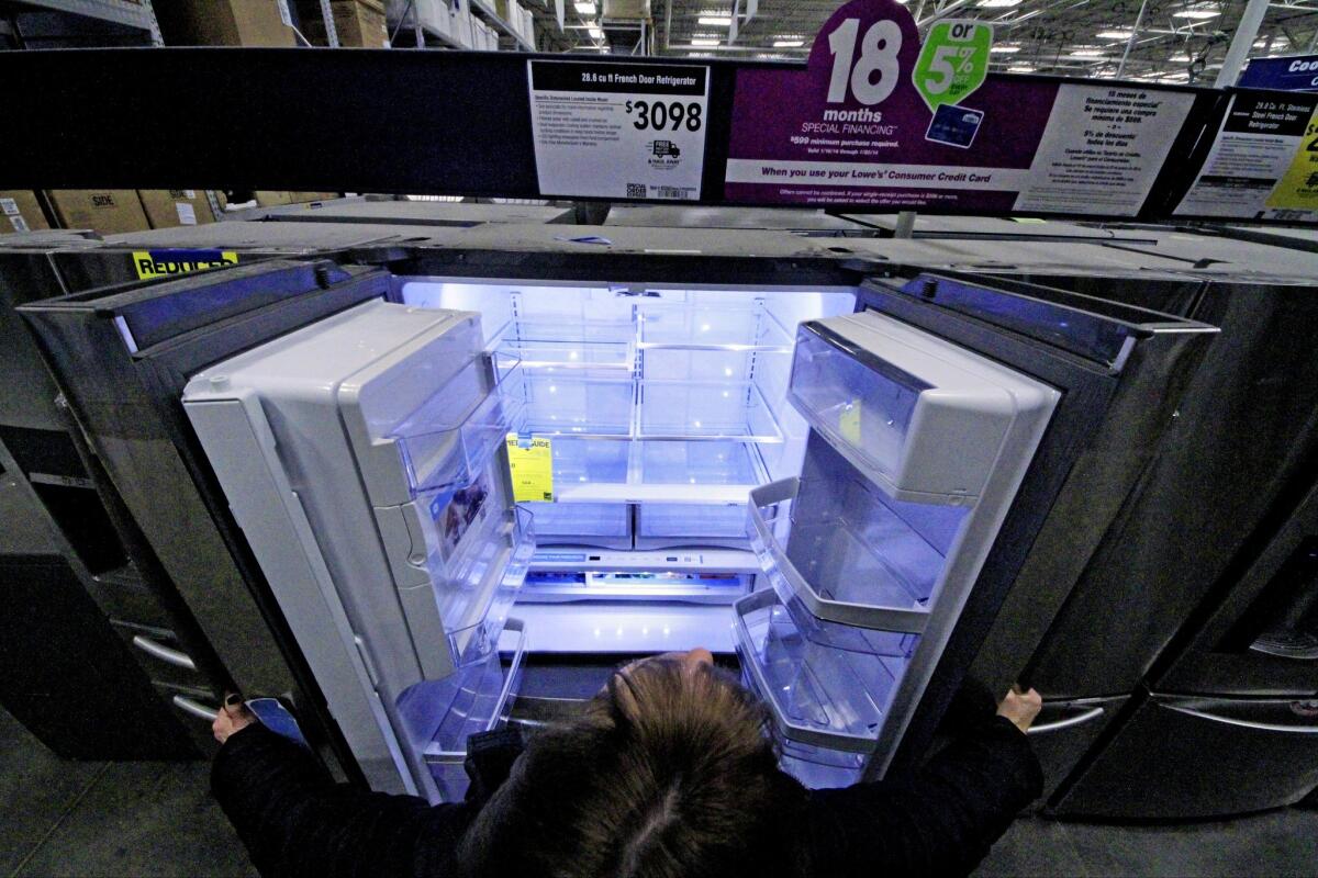 Orders for airplanes, appliances and other long-lasting durable goods dropped sharply last month, adding to some other recent downbeat economic news. Above, a refrigerator at a Lowe's store in Cranberry Township, Pa.