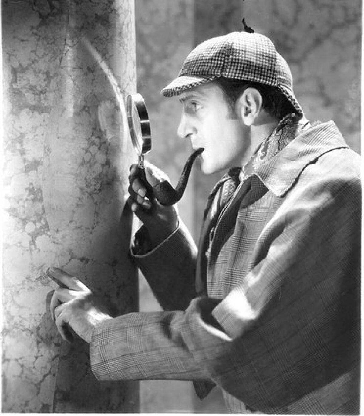 Basil Rathbone playing Sherlock Holmes in 1939's "The Hound of the Baskervilles."