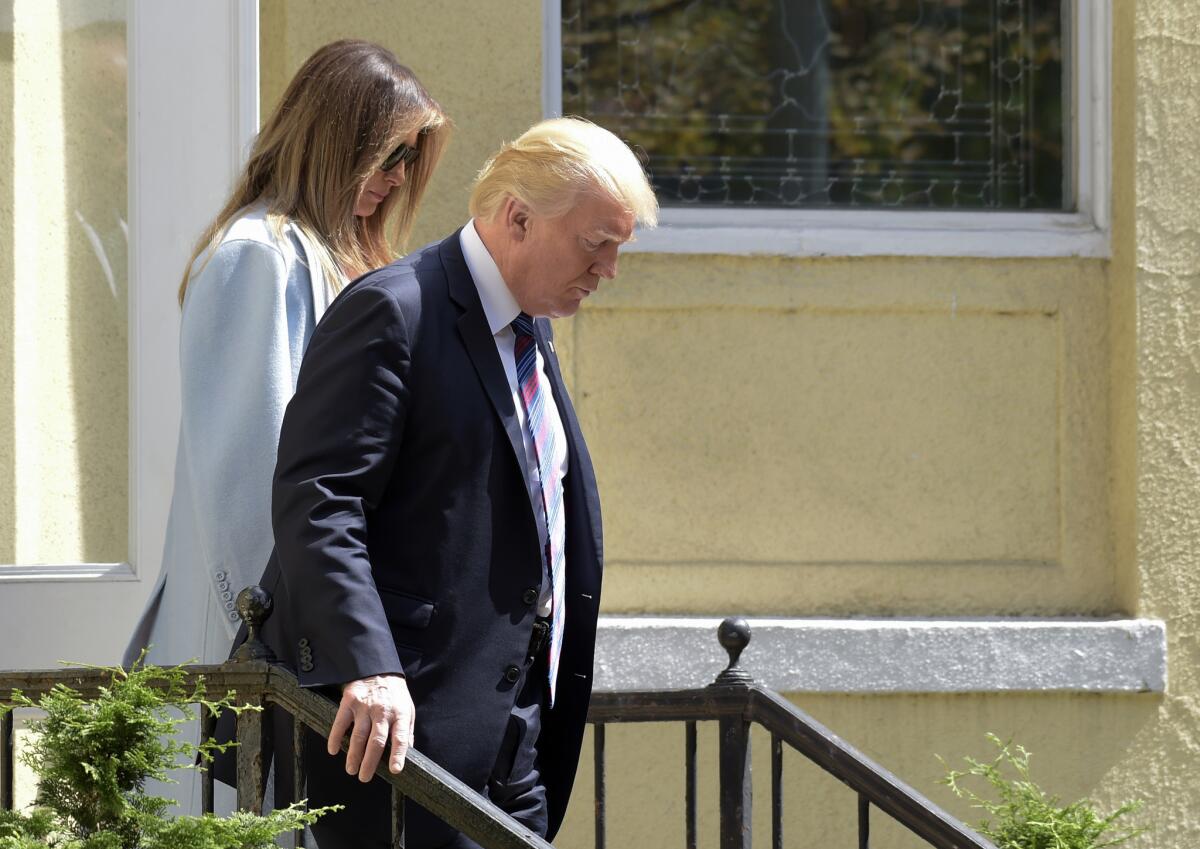 President Trump and First Lady Melania Trump leave after attending services at St. John's Church in Washington on Sunday.