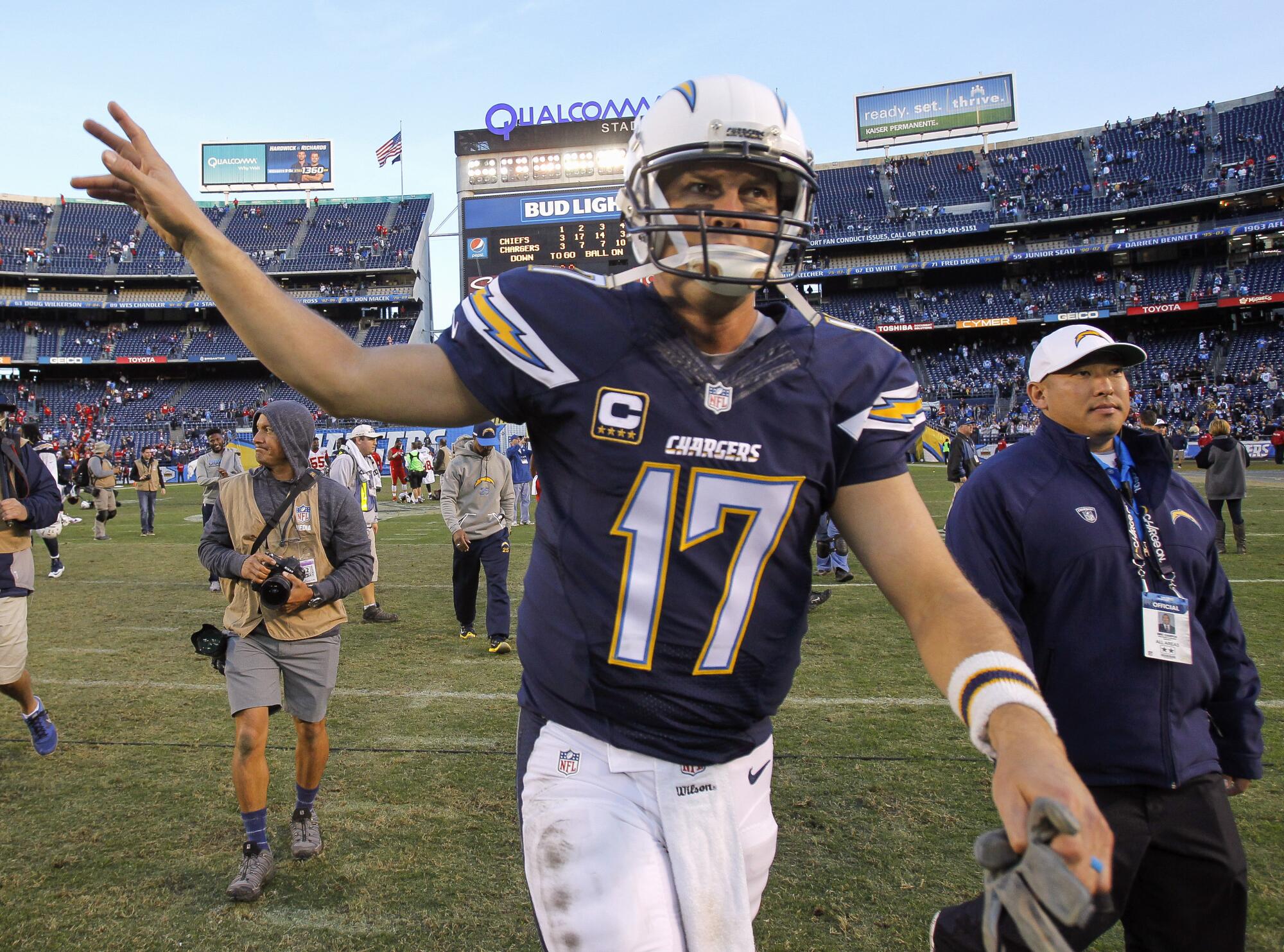 Chargers quarterback Philip Rivers waves as he leaves the field after losing to Kansas City at Qualcomm Stadium.