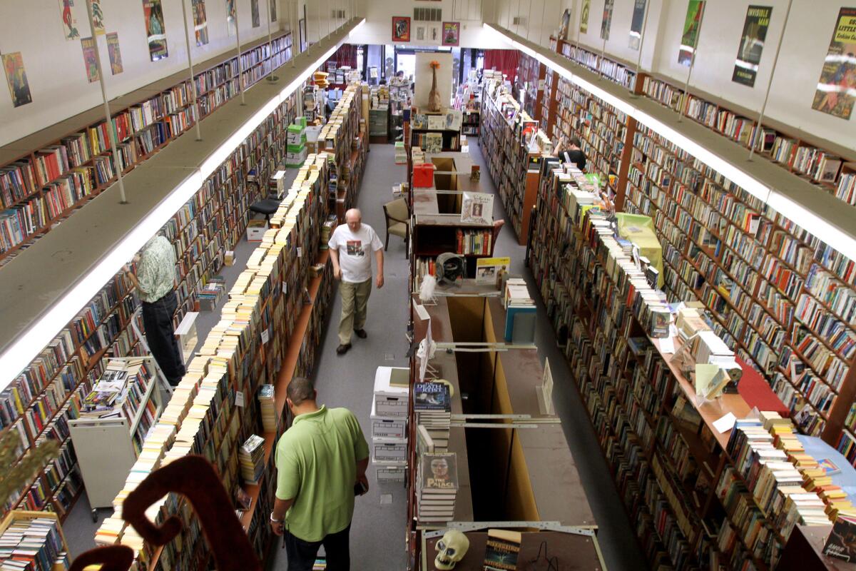 Customers shop at Bookfellows on the 200 block of N. Brand Blvd., on Thursday, June 9, 2016.