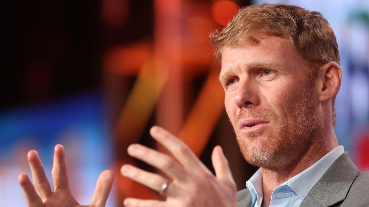 Former U.S. national team defender Alexi Lalas speaks during a panel discussion.