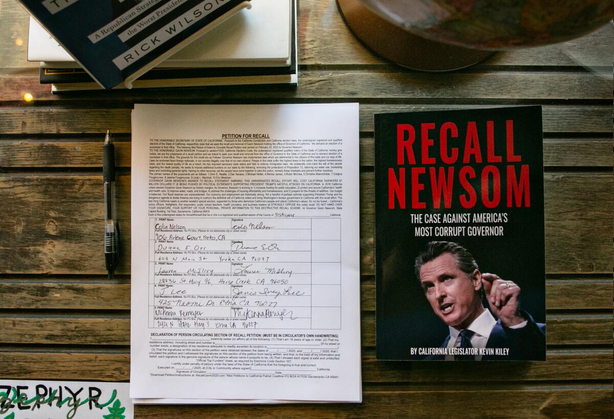 A petition to recall Gov. Gavin Newsom sits outside Zephyr Books and Coffee in Yreka, Calif., on March 4. 