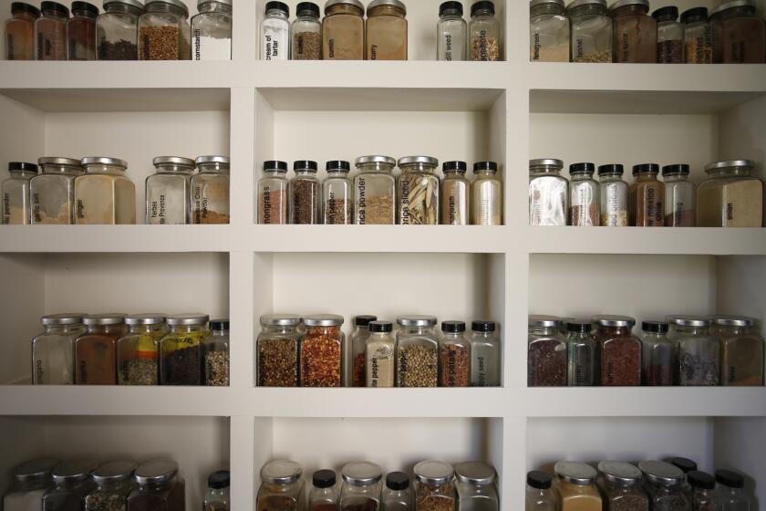 Jill's father made the spice rack in the kitchen pantry.