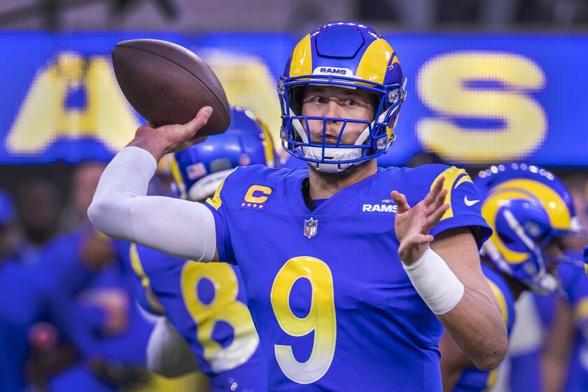 Los Angeles, CA - January 30: Rams quarterback Matthew Stafford passes the ball during their 20-17 victory.