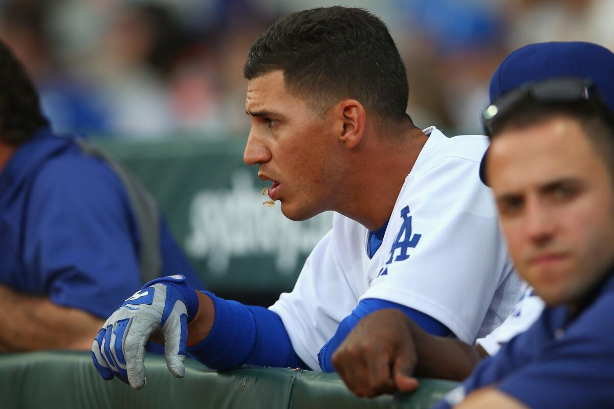 Alex Guerrero looks on from the dugout during the Dodgers' series with the Diamondbacks in Sydney in March.