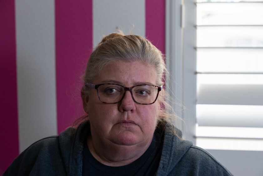 Home of Guiding Hands house manager Jill Perry pauses during an interview on Thursday, Feb. 17 in El Cajon.