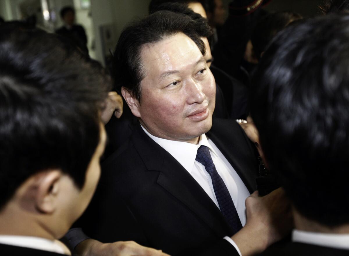 SK Group Chairman Chey Tae-won arrives at the Seoul Central District Court in Seoul on Thursday.