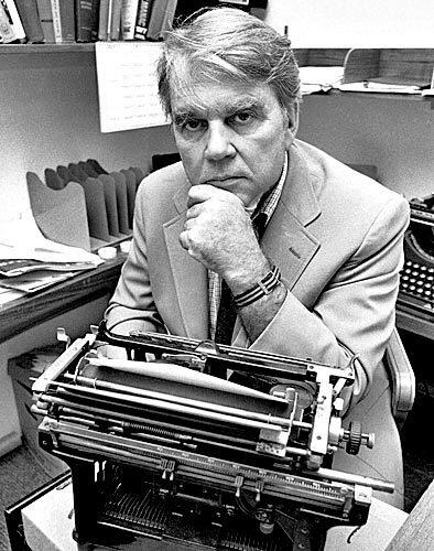 Commentator Andy Rooney of "60 Minutes," poses in his New York office. He made more than 1,000 appearances on the show.