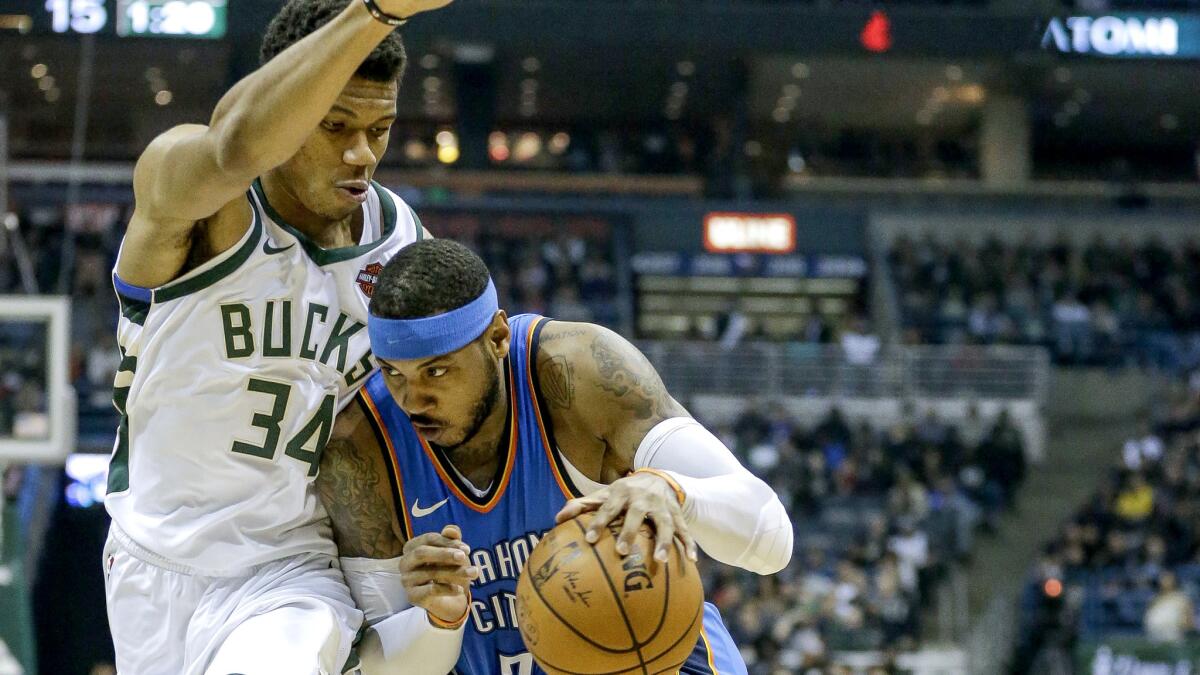 Thunder forward Carmelo Anthony drives against Bucks forward Giannis Antetokounmpo during the first half Tuesday.