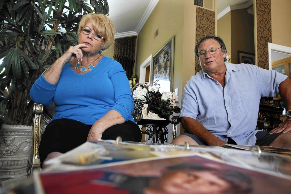 Bob and Connie Vargo, parents of slain 6-year-old Jeffrey Vargo, look over a photo album in their Anaheim home in March.