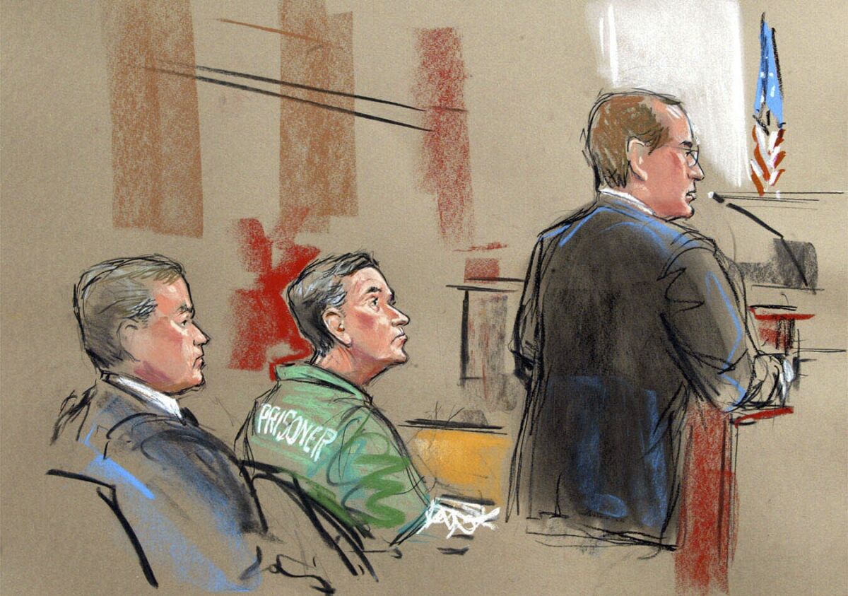 FILE - In this artist depiction, U.S. Attorney Randy Bellows, right, addresses the court during the sentencing of convicted spy Robert Hanssen, center, seen with his attorney Plato Cacheris, left, at the federal courthouse in Alexandria, Va., May 10, 2002. Hanssen was given a life sentence. The former FBI agent who took more than $1.4 million in cash and diamonds to trade secrets with Russia and the former Soviet Union in one of the most notorious spying cases in American history has died in prison.(William Hennessy, Jr. via AP)