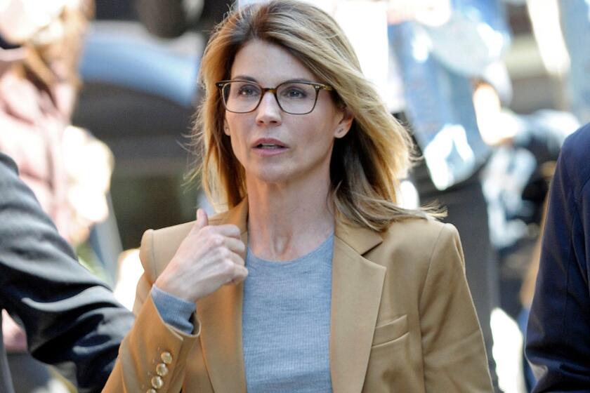 Actress Lori Loughlin arrives at court on April 3 in Boston to face charges in connection with the college admissions scandal.