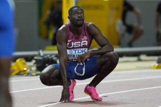 Rai Benjamin, of the United States, reacts after placing second in the men's 400-meters final during the World Athletics Championships in Budapest, Hungary, Wednesday, Aug. 23, 2023. (AP Photo/Ashley Landis)
