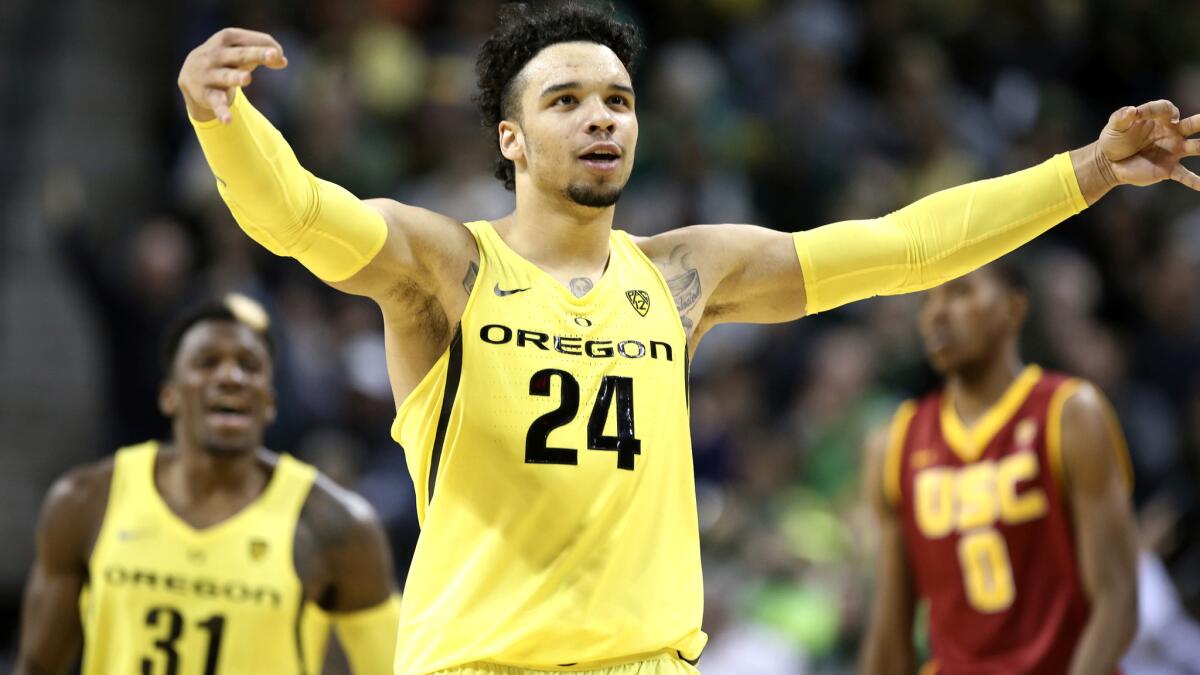 Oregon guard Dillon Brooks (24) celebrates after making one of his six three-point shots against USC on Friday night.