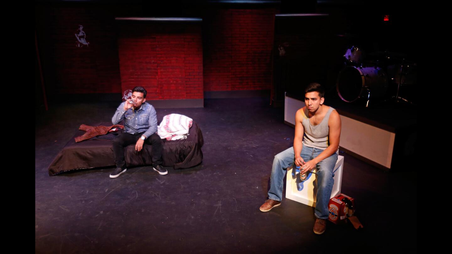 Edmundo Rubia, left, and Andrew Puente rehearse for the play "Teatro Moz," a series of short plays inspired by the Mexican American fandom devoted to former Smiths frontman Morrissey at Casa 0101 Theater.