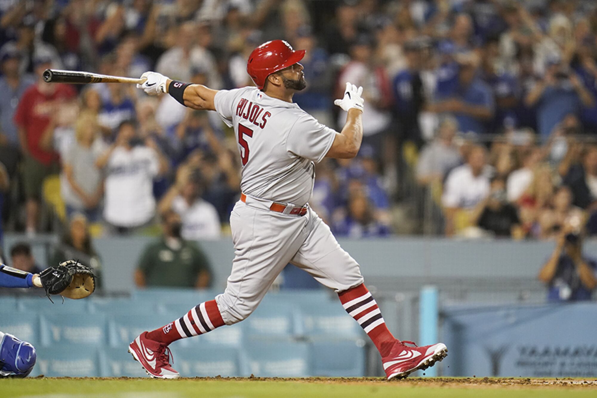 Albert Pujols hits his 700th career homerun in the fourth inning on Friday.