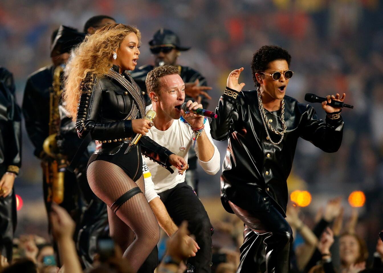 Beyonce, Chris Martin of Coldplay and Bruno Mars perform during the Pepsi Super Bowl 50 Halftime Show at Levi's Stadium on February 7, 2016 in Santa Clara, California. Photo by Ezra Shaw/Getty Images