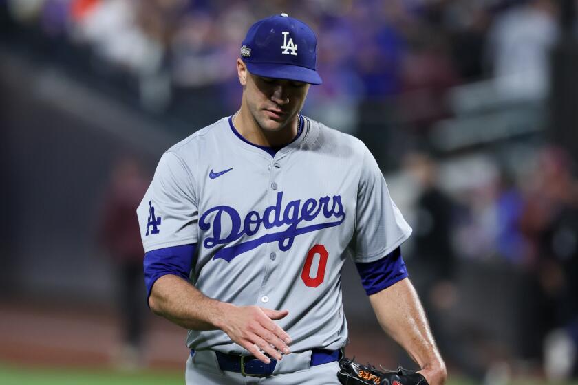 NEW YORK, NEW YORK - OCTOBER 18: Jack Flaherty #0 of the Los Angeles Dodgers leaves the field.