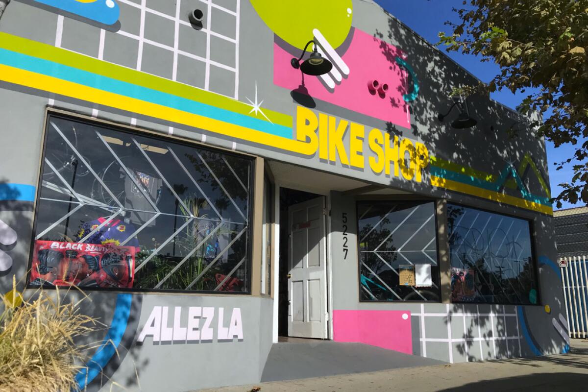 The colorful exterior of Allez LA Bike Shop