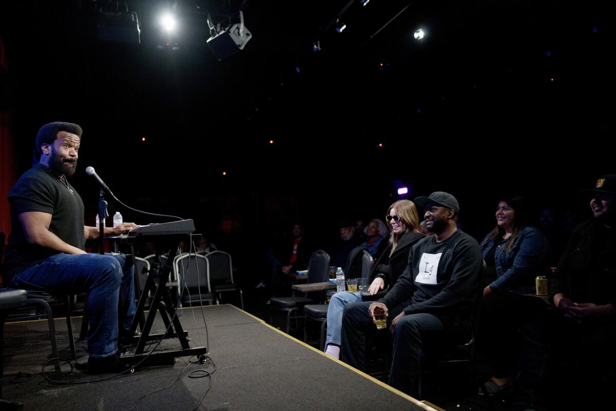 Comedian Craig Robinson performs astatine the Upstairs Comedy Club