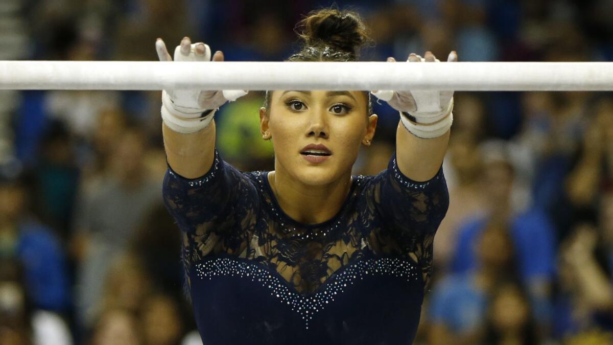 UCLA's Kyla Ross competes on uneven bars during a Pac-12 meet against Arizona State at Pauley Pavilion on January 21, 2019.