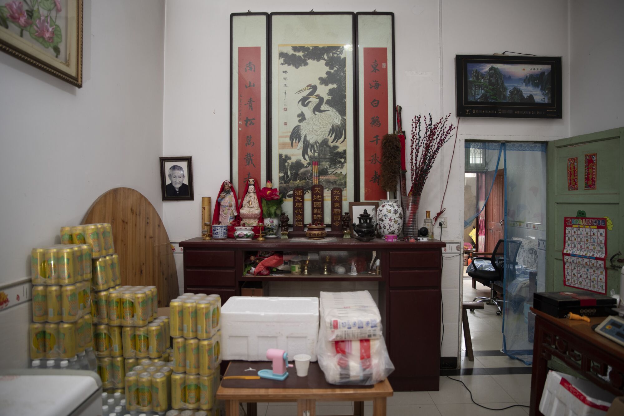 Pan Bangfeng converted the entrance hall to his home into a makeshift mini-mart during the lockdown.