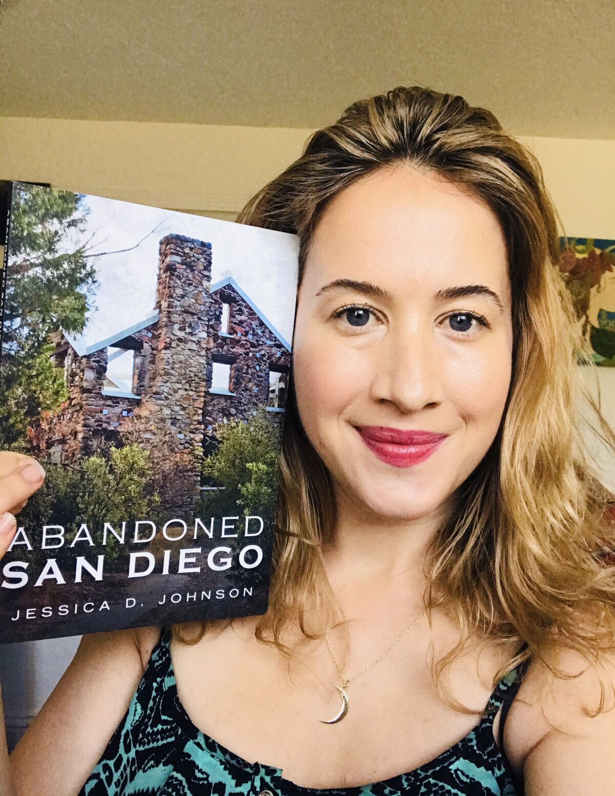 Author Jessica Johnson with her book “Abandoned San Diego”