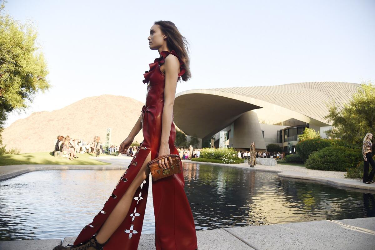 A model shows a gown from the Louis Vuitton 2016 Cruise Collection, designed by Nicolas Ghesquière, at the Bob and Dolores Hope estate in Palm Springs.