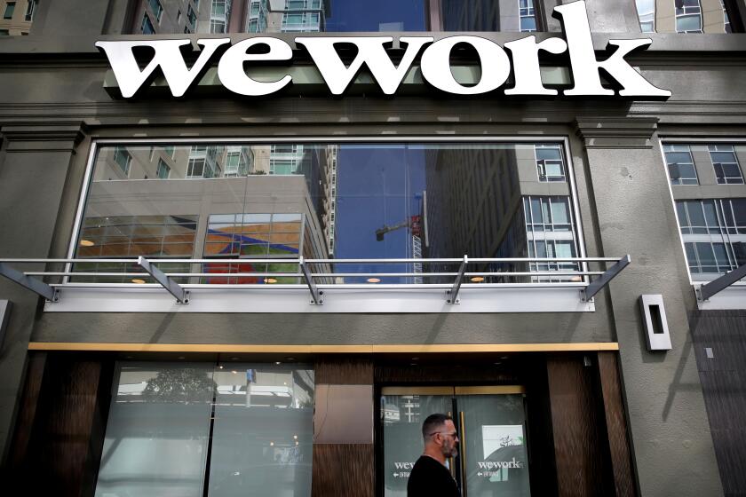 SAN FRANCISCO, CALIFORNIA - OCTOBER 07: A sign is posted on the exterior of a WeWork office on October 07, 2019 in San Francisco, California. Days after withdrawing its registration for an initial public offering, WeWork also warned employees that the company could be set to lay off nearly 2,000 people, about 16 percent of its workforce. (Photo by Justin Sullivan/Getty Images) ** OUTS - ELSENT, FPG, CM - OUTS * NM, PH, VA if sourced by CT, LA or MoD **