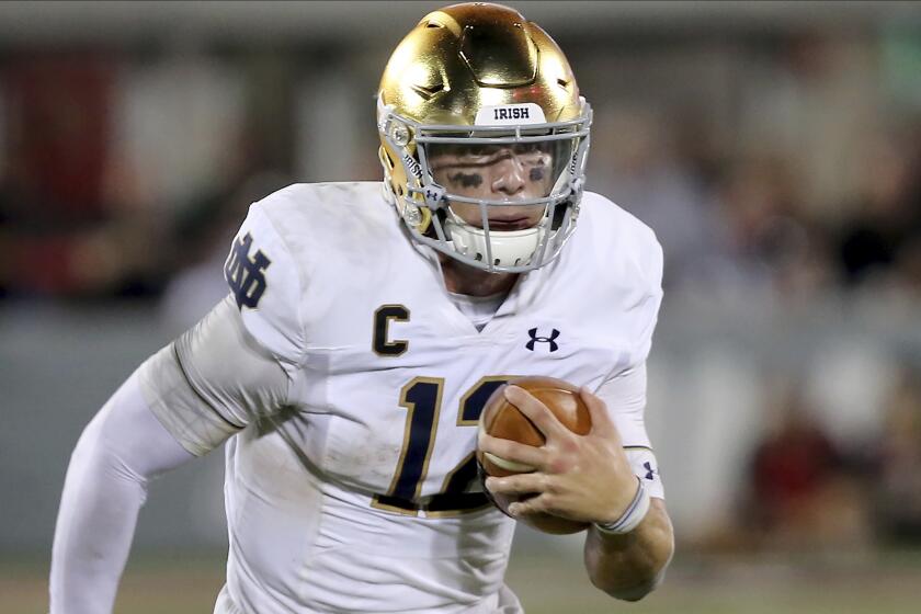 Notre Dame quarterback Ian Book during an NCAA football game on Monday, Sept. 2 , 2019 in Louisville , Ky . (AP Photo/Tony Tribble)