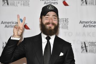 The Hal David Starlight Award recipient Post Malone arrives at the 52nd annual Songwriters Hall of Fame induction and awards ceremony at the New York Marriott Marquis Hotel on Thursday, June 15, 2023, in New York. (Photo by Evan Agostini/Invision/AP)