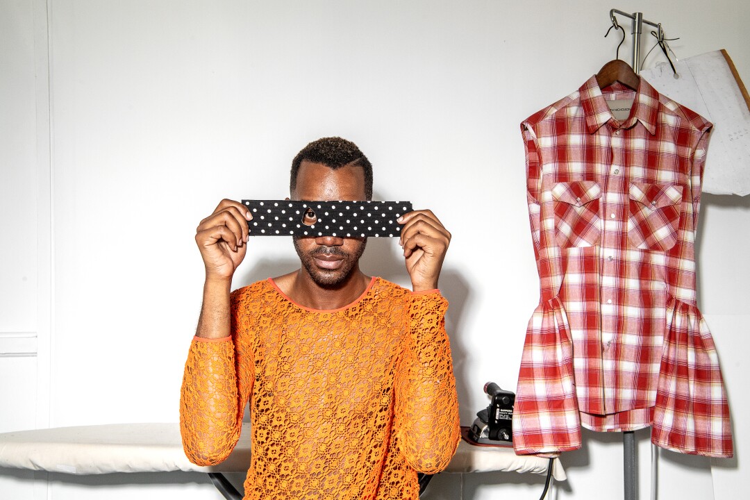 Designer Kenneth Nicholson wearing his own designs.