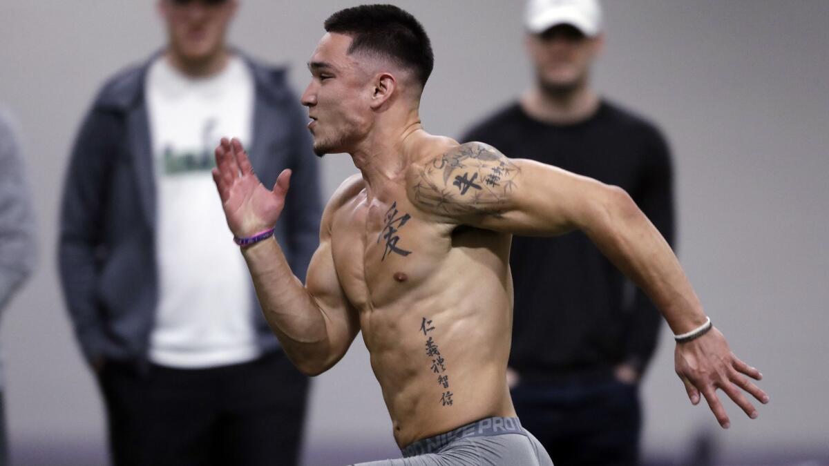 Taylor Rapp runs during an NFL football Pro Day on April 1 in Seattle.