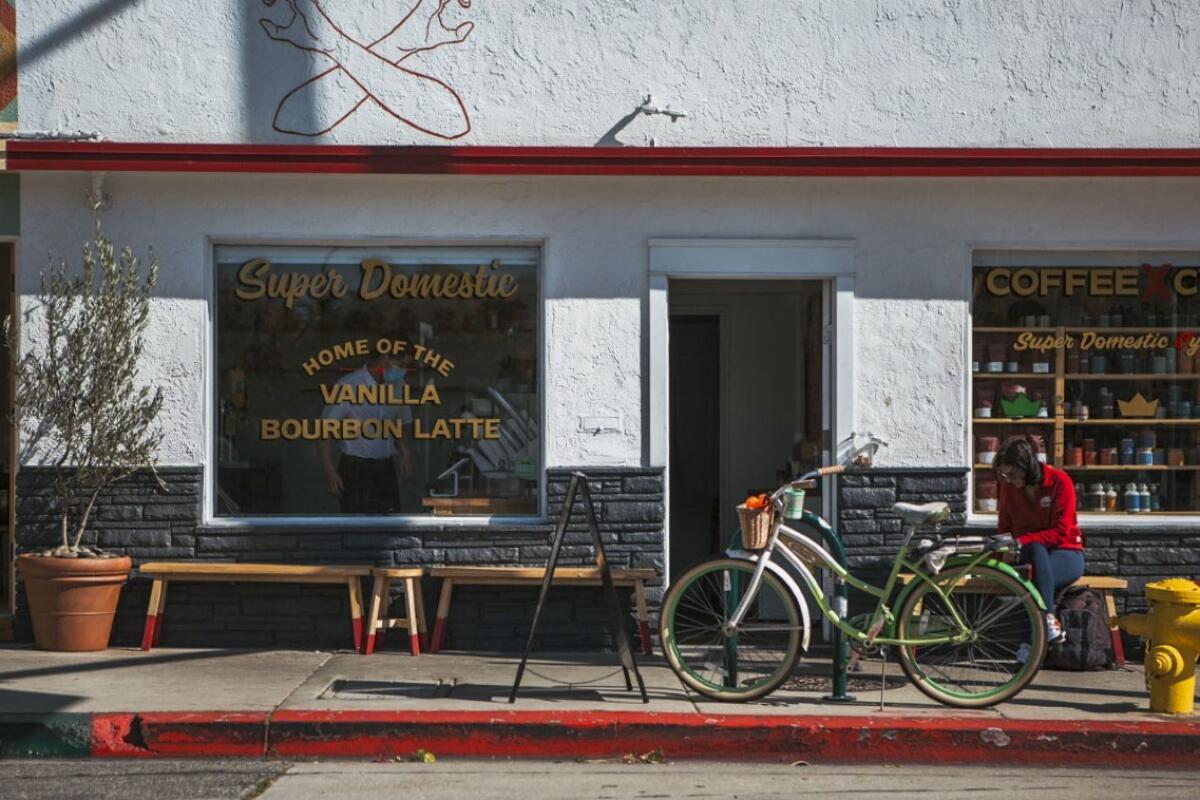 Bicycles and benches outside Super Domestic Coffee on Culver Boulevard
