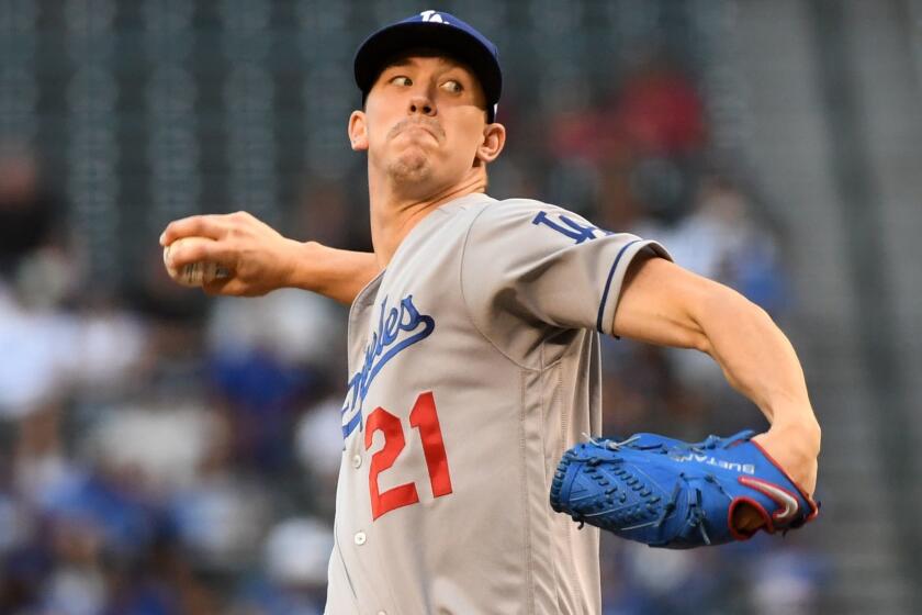 PHOENIX, ARIZONA - JUNE 03: Walker Buehler #21 of the Los Angeles Dodgers delivers a first inning pitch against the Arizona Diamondbacks at Chase Field on June 03, 2019 in Phoenix, Arizona. (Photo by Norm Hall/Getty Images) ** OUTS - ELSENT, FPG, CM - OUTS * NM, PH, VA if sourced by CT, LA or MoD **