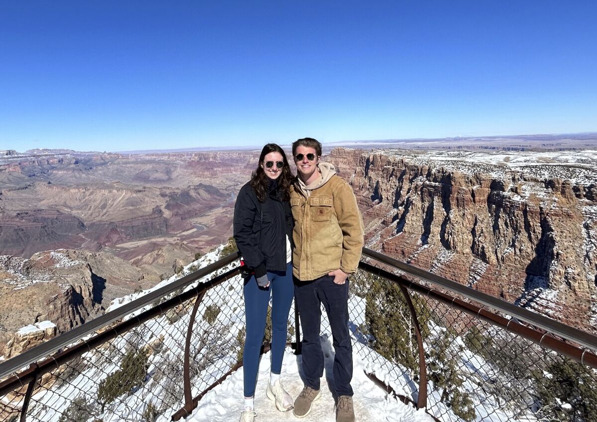 This Jan. 28, 2023, photo shows Liv Loughlin and her boyfriend, Hollister Van Nice, at the Grand Canyon. The two met on Bumble. Whether looking for love or a casual encounter, 3 in 10 U.S. adults say they have used a dating site or app — with mixed experiences, according to a Pew Research Center study. (Liv Loughlin via AP)